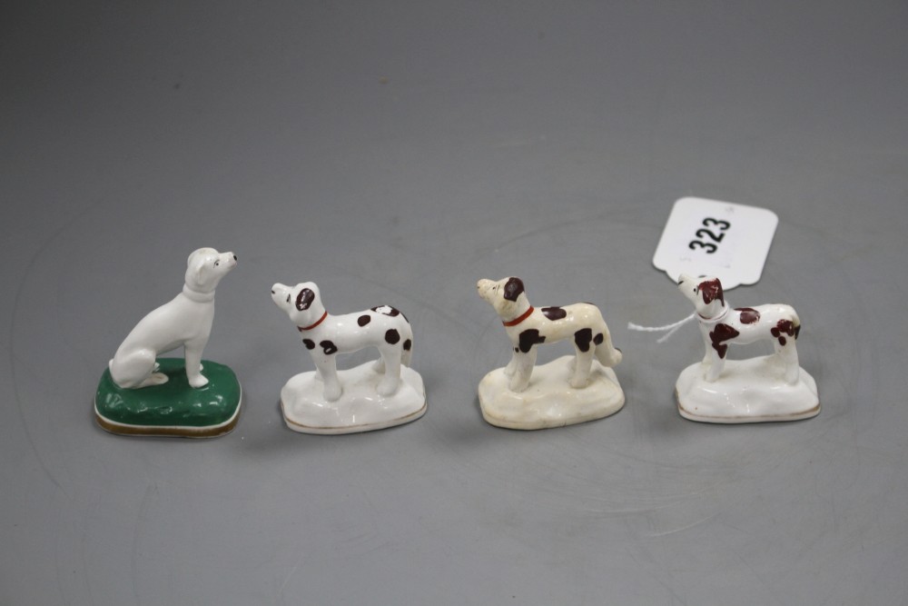 Four Staffordshire porcelain toy figures of two setters and two pointers, c.1835-50, H. 4.6 - 5.5cm (4)